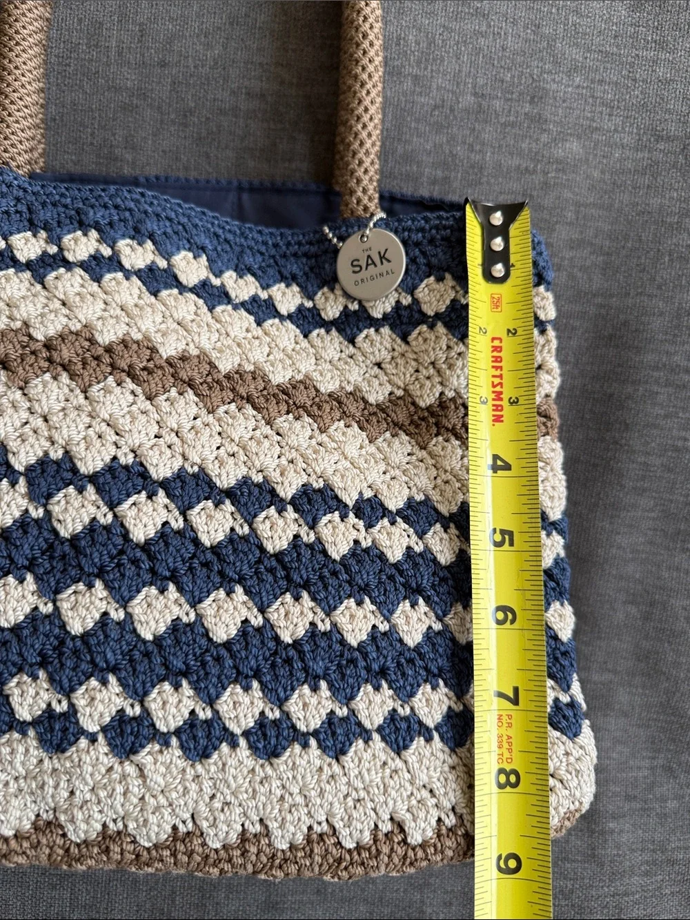 The Sak Crochet Knit Tote in Navy, Cream & Brown with Rope Handles